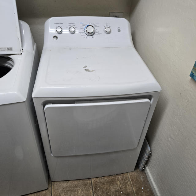a dryer in a laundry room