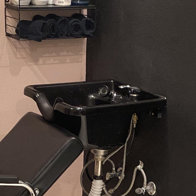 a stylist shampoo bowl and chair